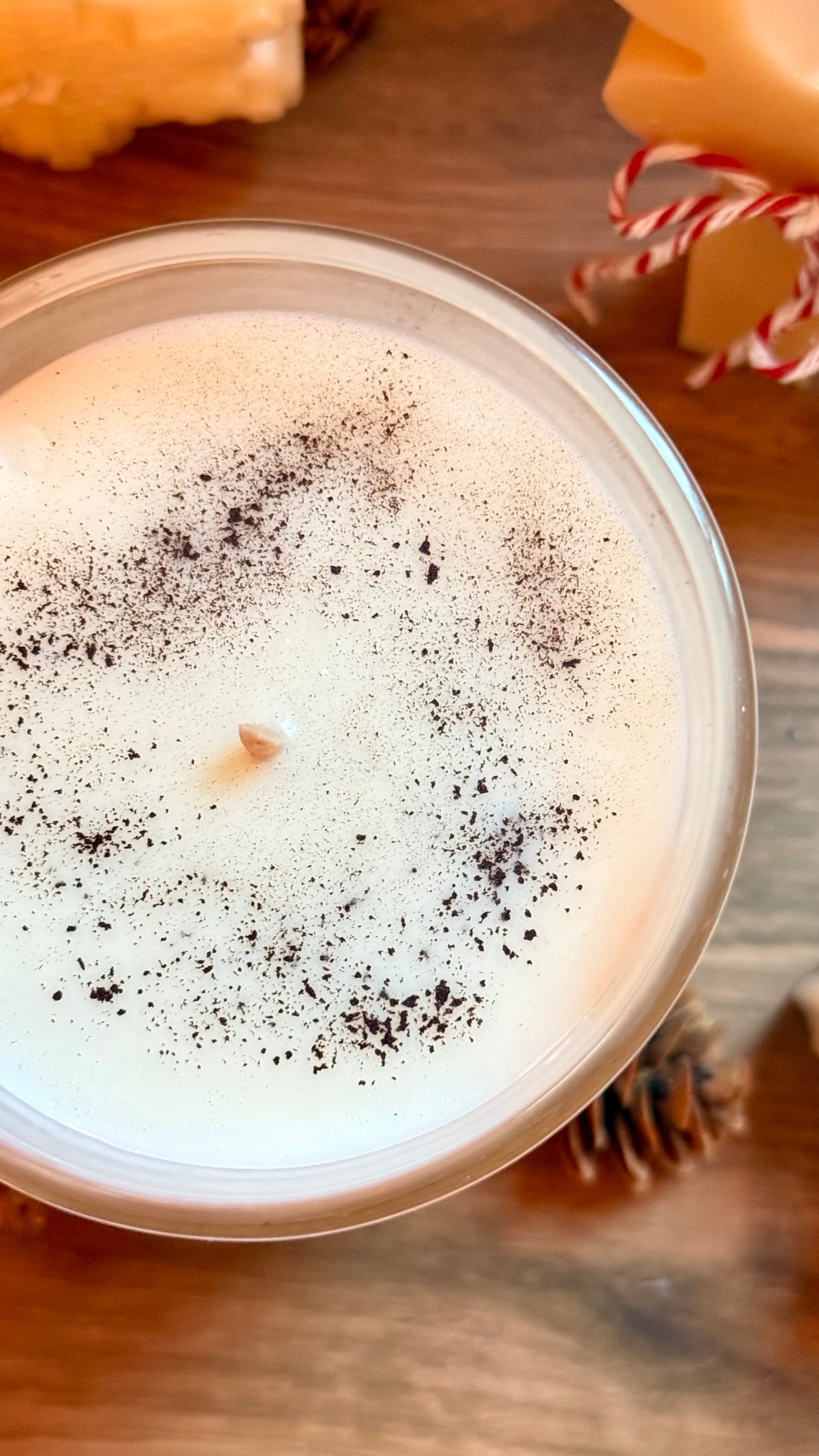 Close-up of a frothy beverage with a wooden background